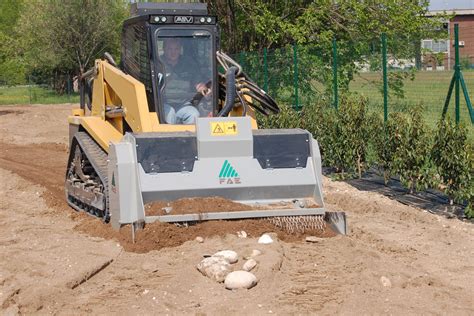 skid steer stone crusher attachment